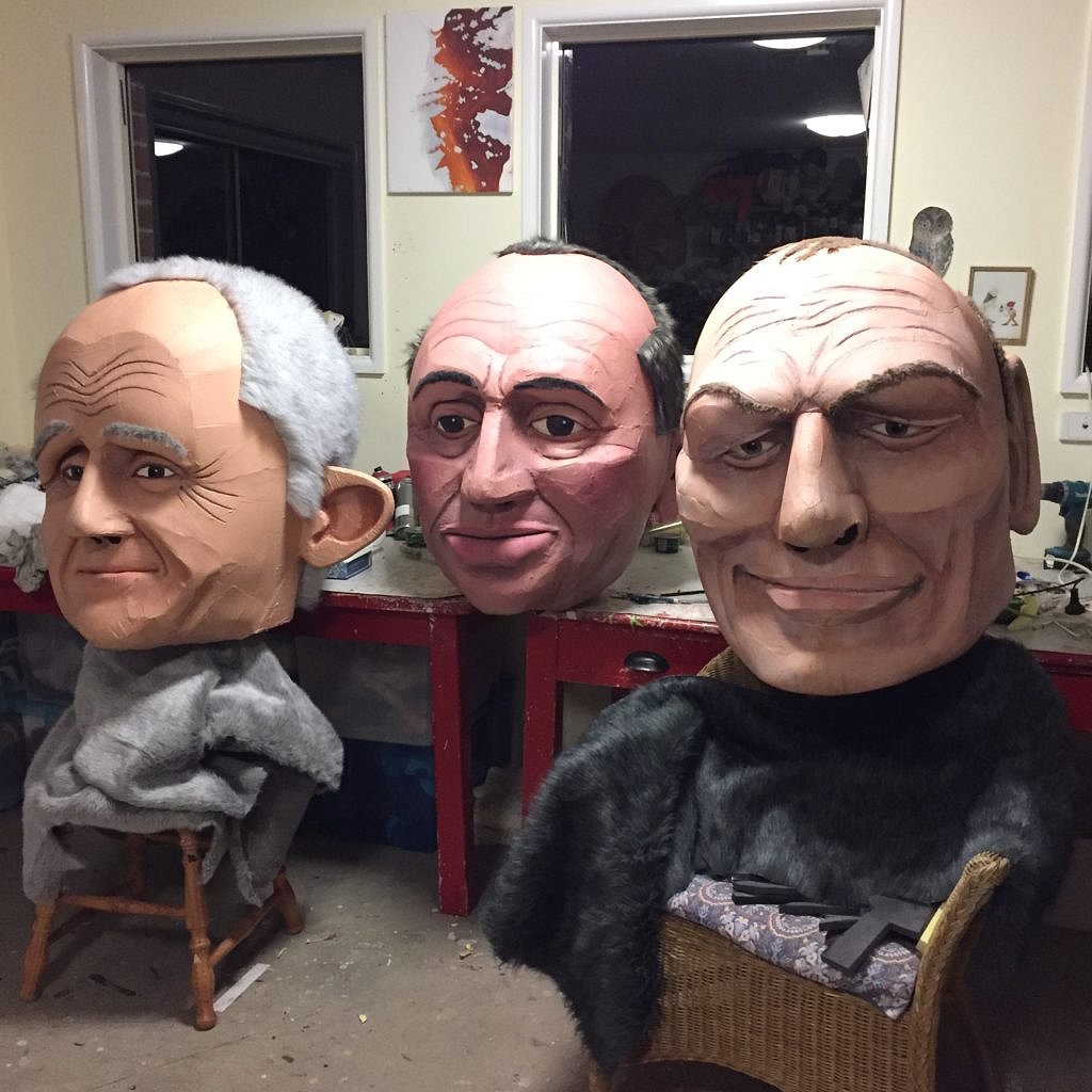 Trio of big head puppets